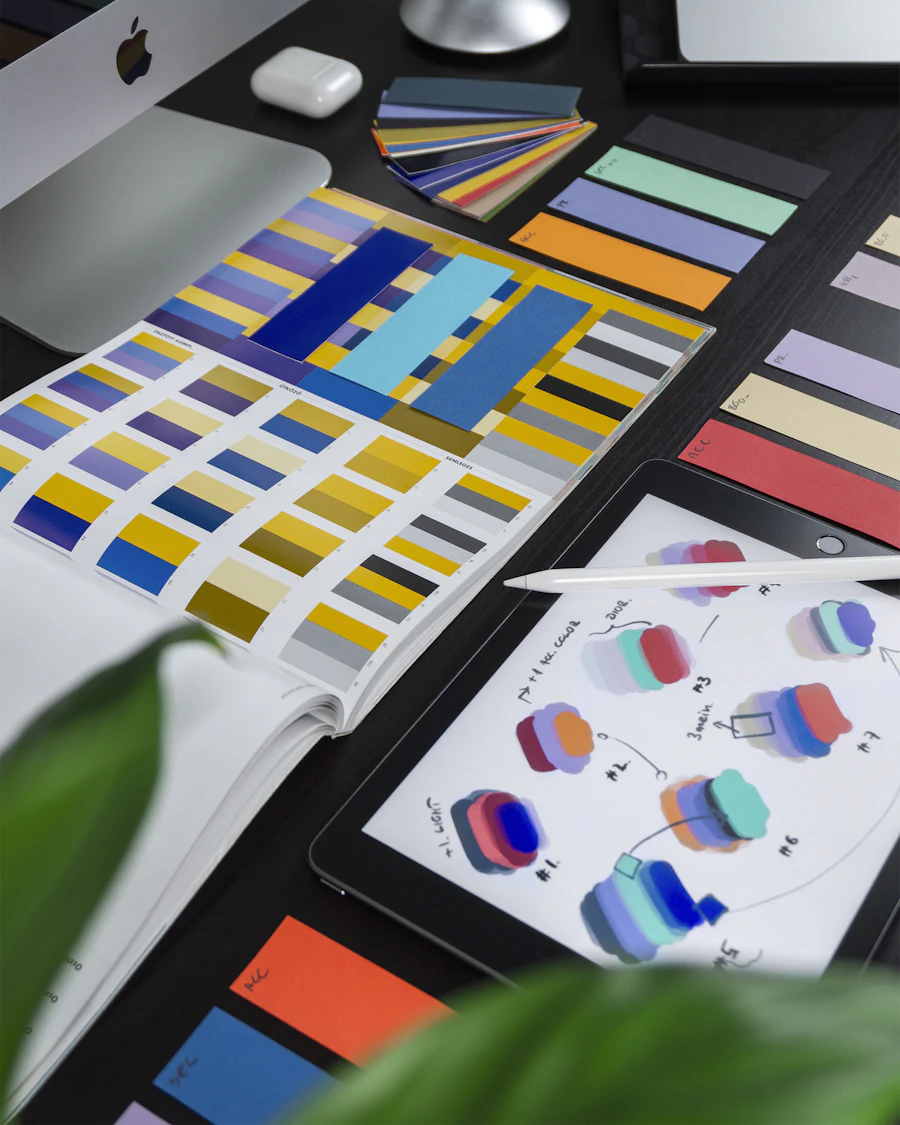Colour swatches and design samples on a table